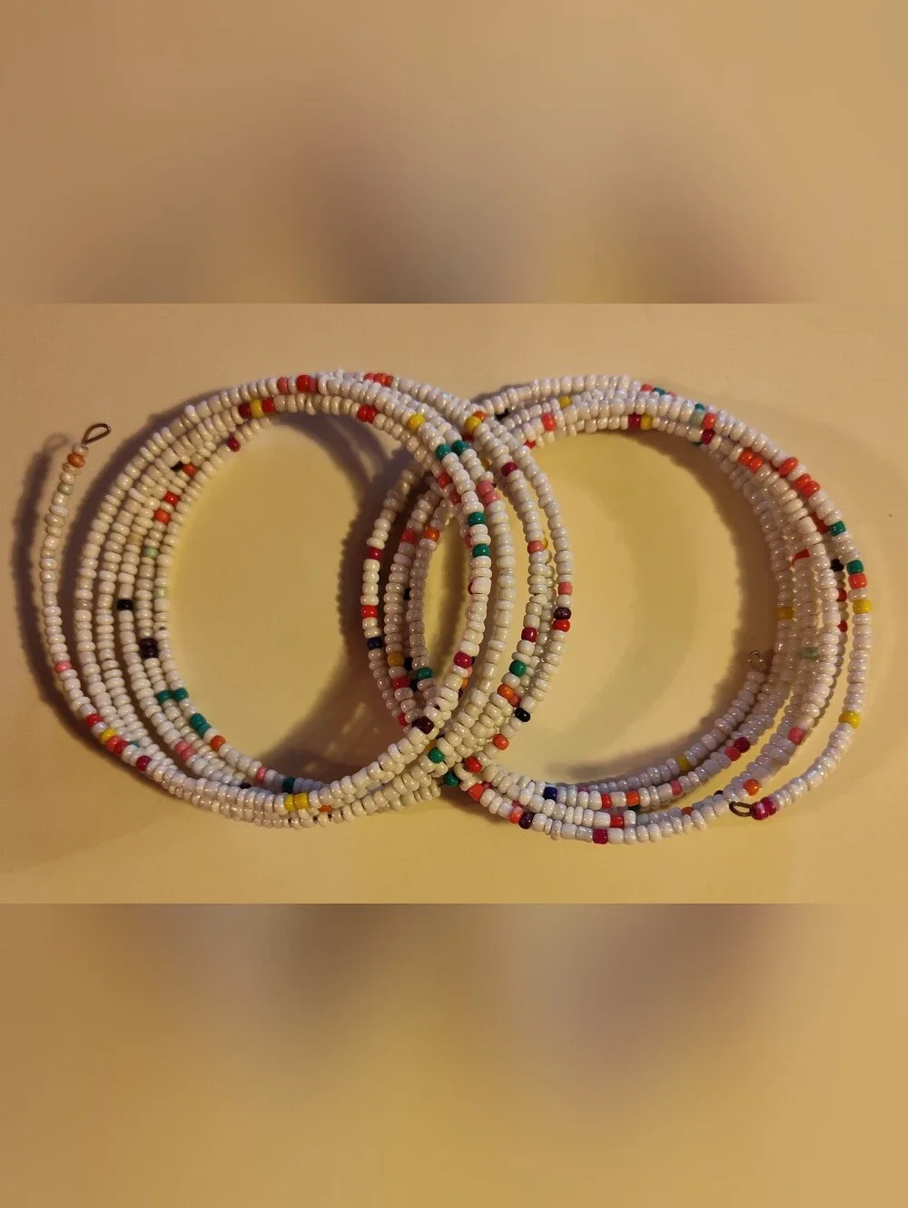 2 Handmade White Seed Bead Coil Bracelets with Multicolor Beaded Accents